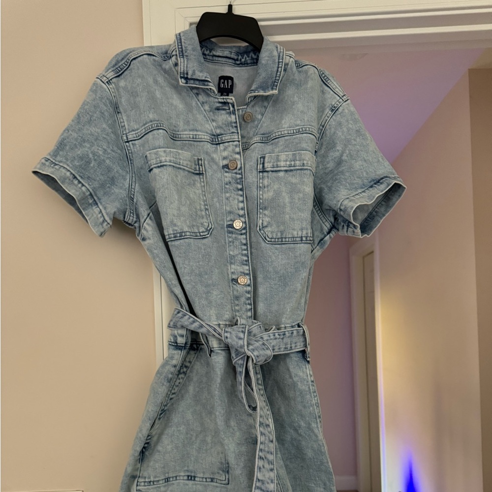 Classic short jumper w/belted waist, button front, and pockets for a relaxed fit